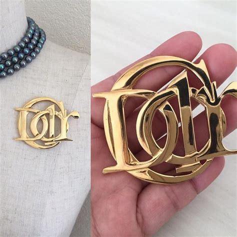 dior logo brooch|genuine christian dior bracelet.